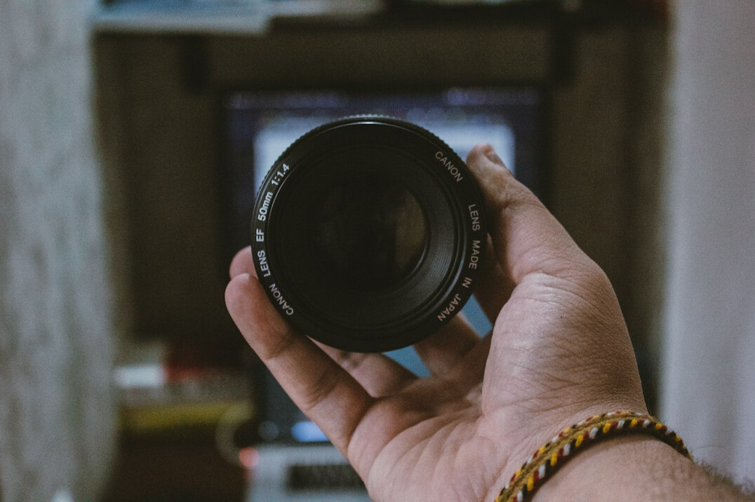 Close-up of a professional video camera lens
